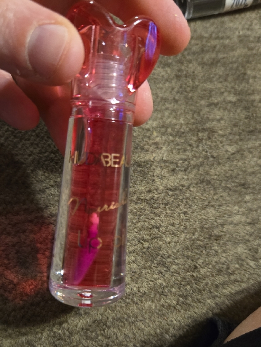 Revlon Lip Gloss, Huda Beauty Lip Oil, And Lip Balm - Picture 9 of 9